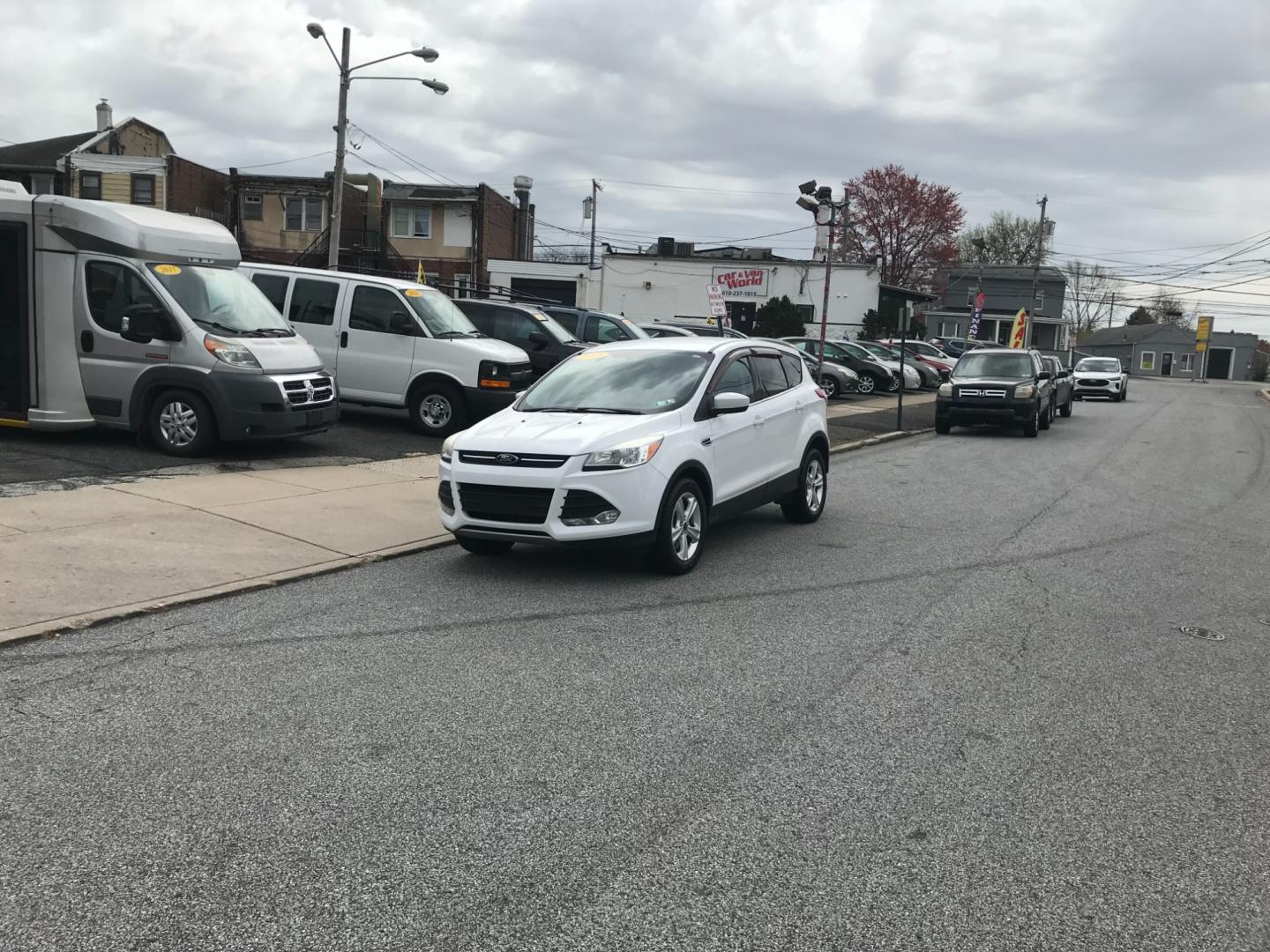 2015 White /Gray Ford Escape SE (1FMCU9G96FU) with an 2.0 engine, Automatic transmission, located at 577 Chester Pike, Prospect Park, PA, 19076, (610) 237-1015, 39.886154, -75.302338 - Photo#1